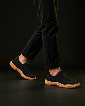 Kravos FlowKnit — Black / Gum — 03-walking-motion