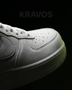 NK Leather Script-Heel Court Trainer