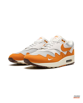 NK Leather Wavy-Panel Air Trainer